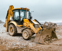 Retroescavadora amarela para obras e construção civil - Categoria Retroescavadoras